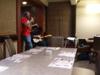 Man in red near the dinning table